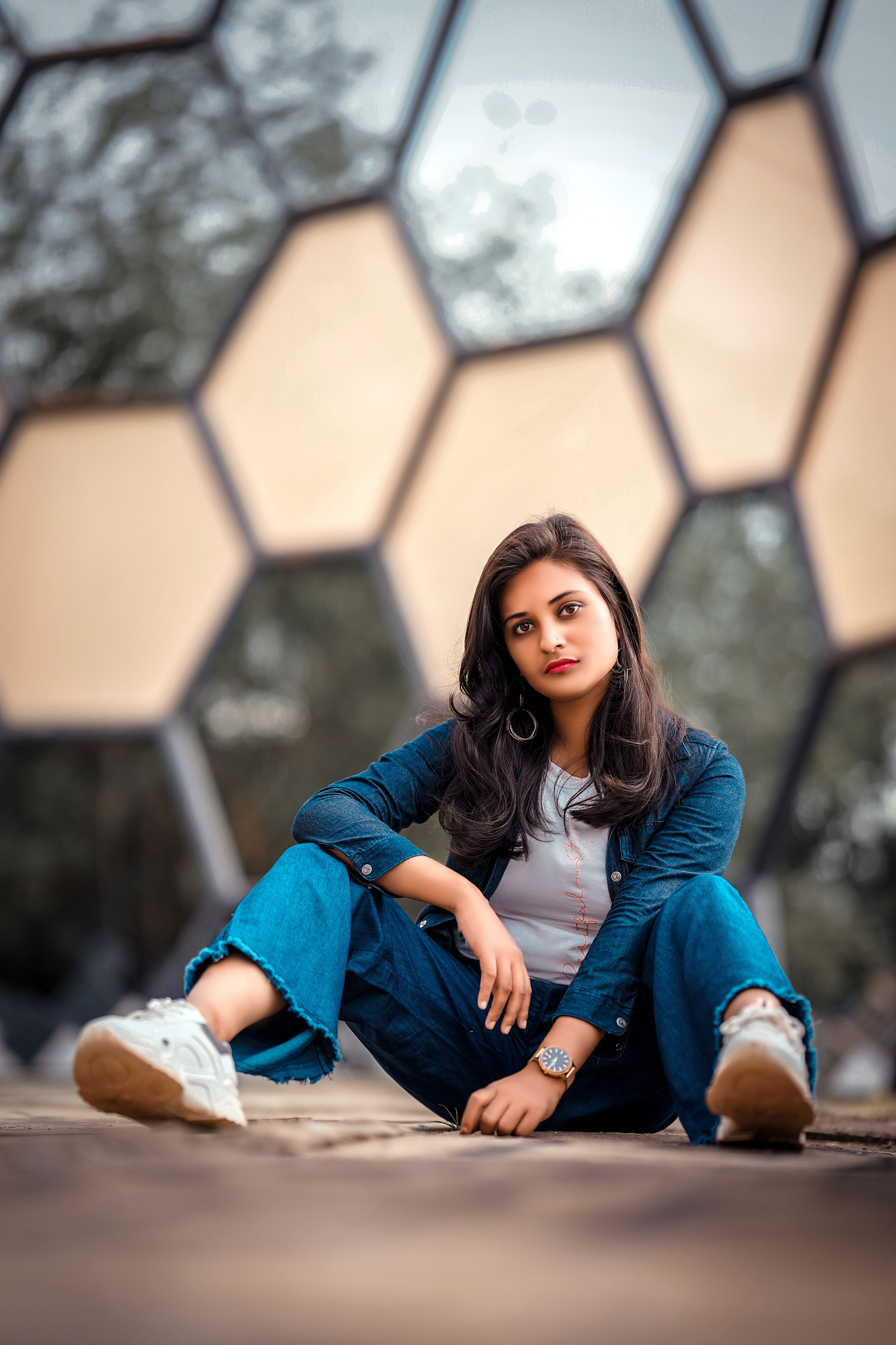 Photo of a Woman Sitting on the Ground · Free Stock Photo