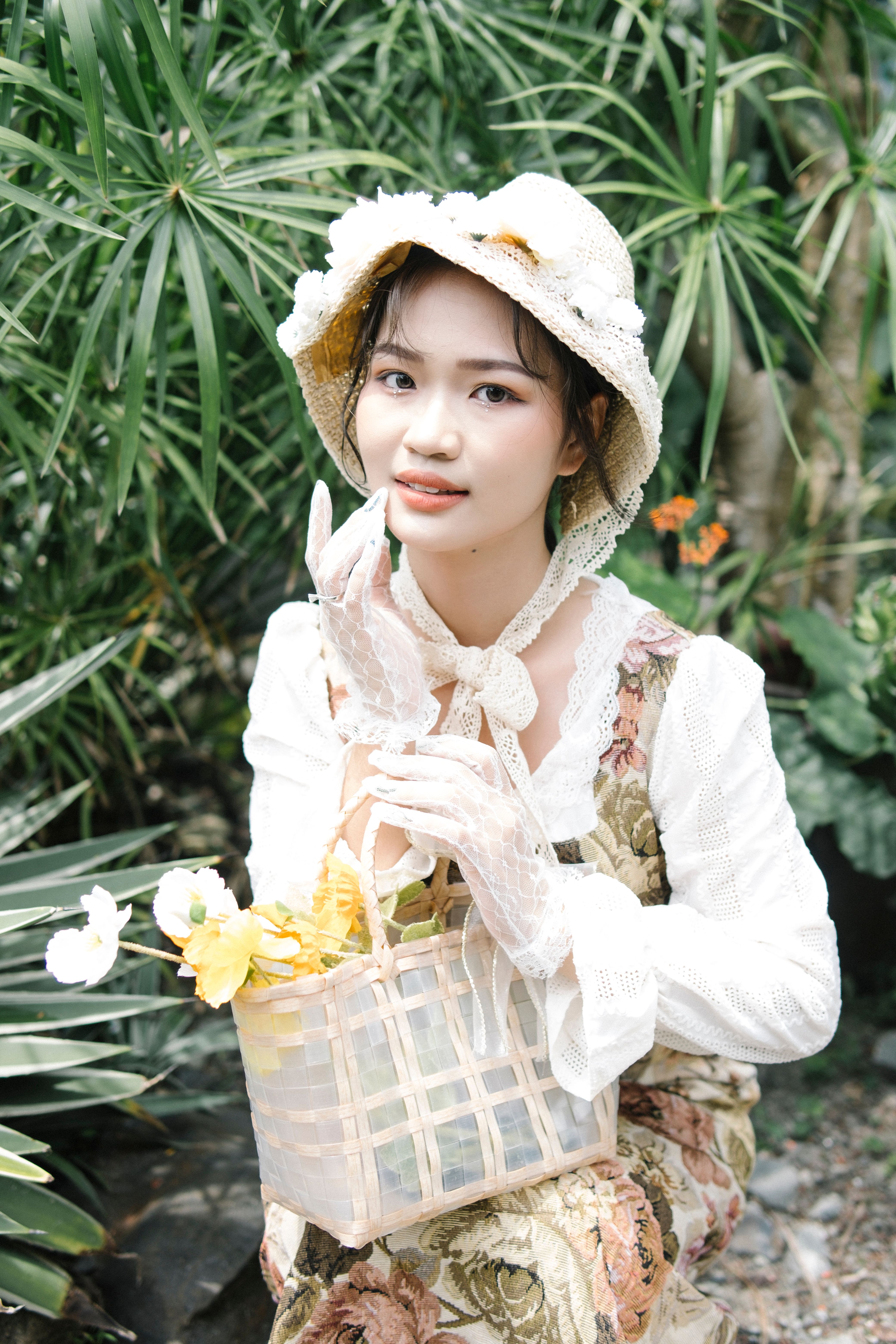 A Woman in Floral Dress with a Bag of Flowers · Free Stock Photo