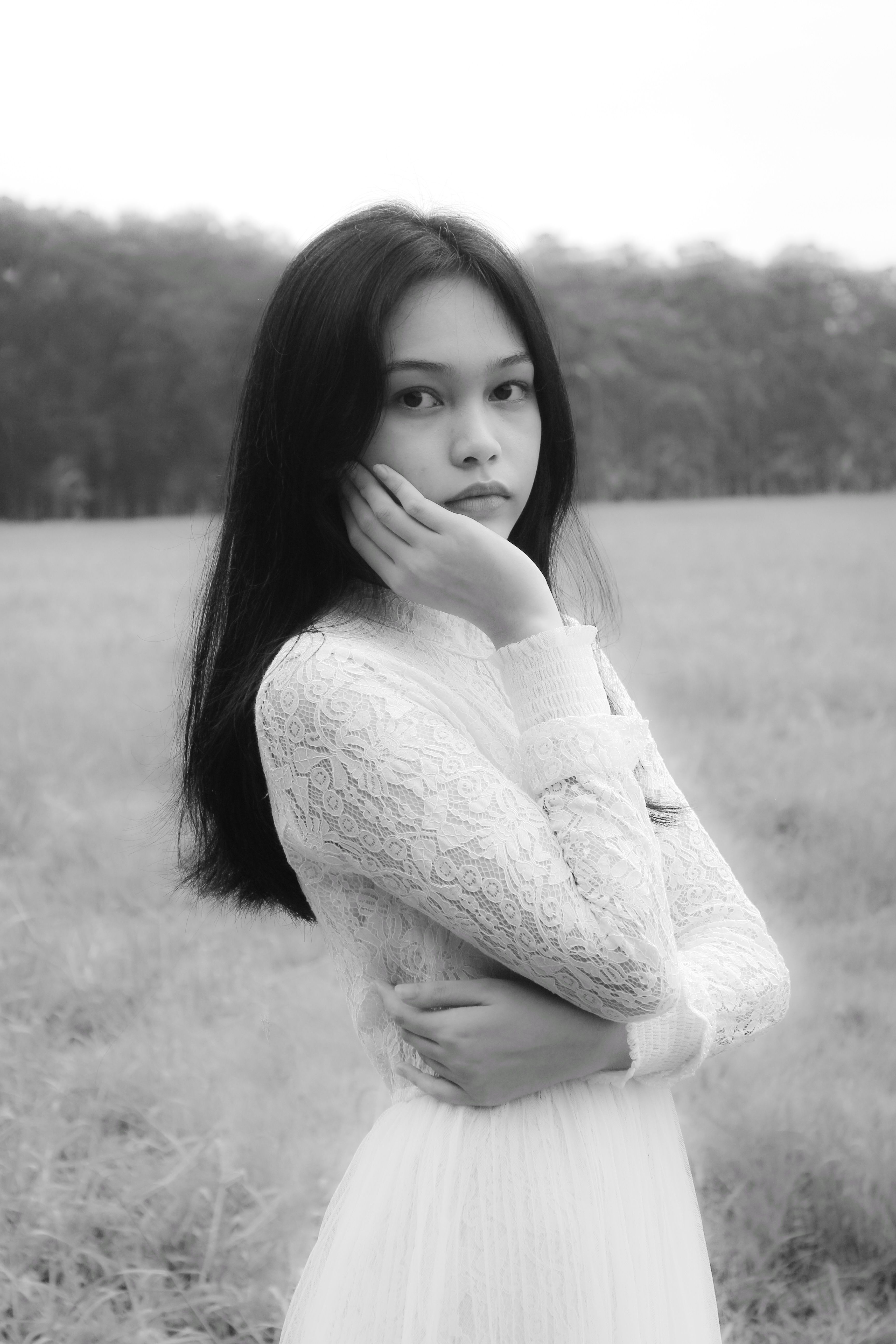 Grayscale Photo of a Woman Posing with Her Hand on Her Cheek · Free ...