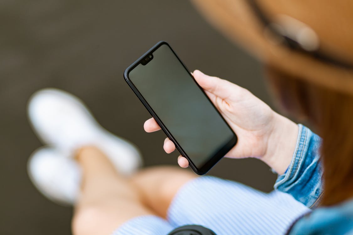 a person using a smartphone at night