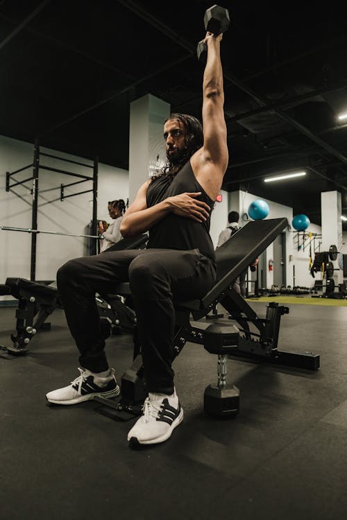 One woman chest press exercise hi-res stock photography and images