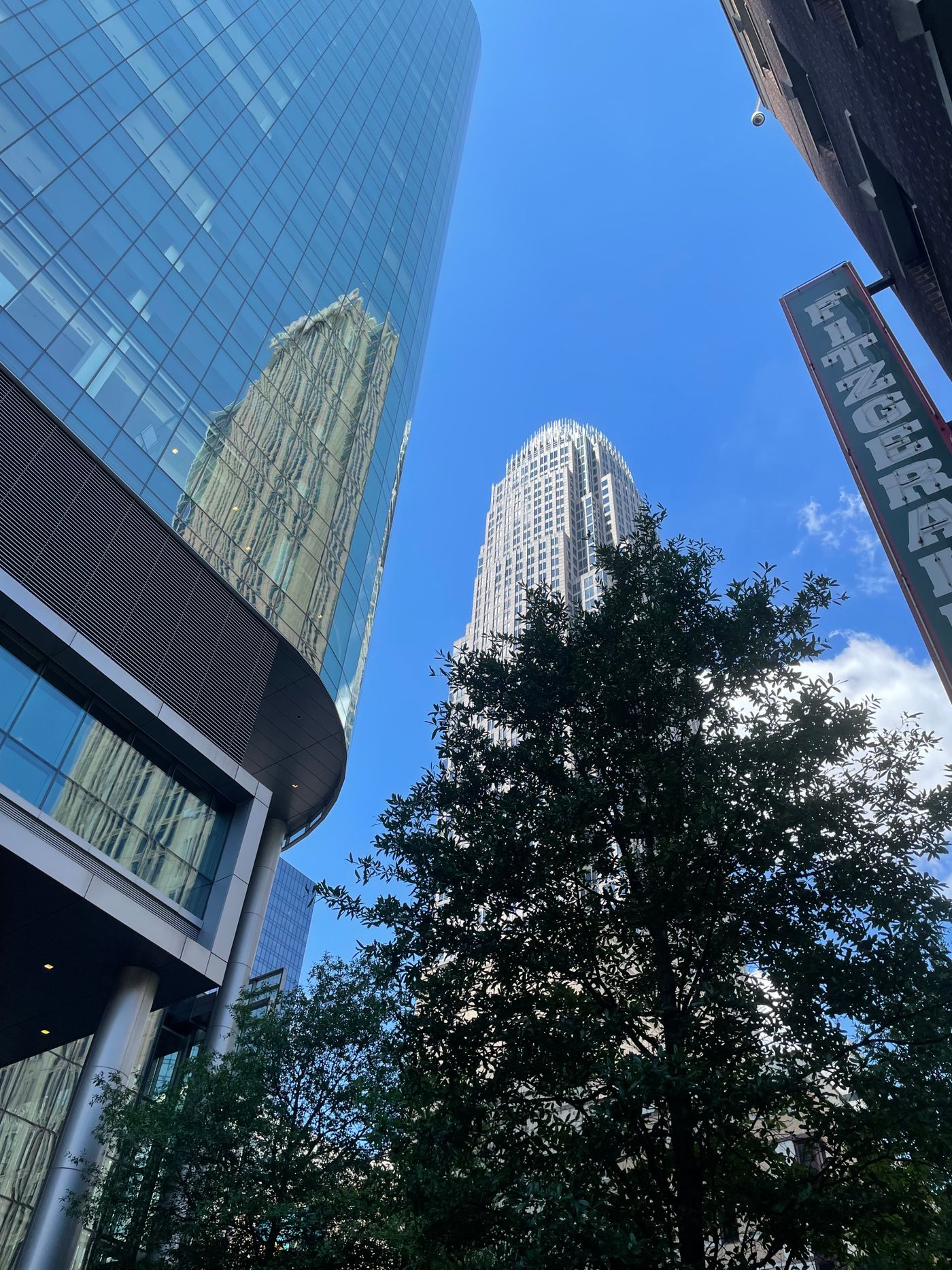 View of the Charlotte NC metro skyline under a bright sky