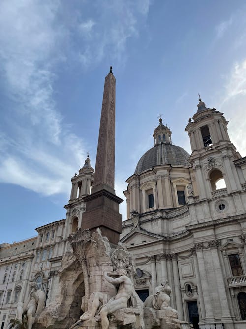 Obelisk with Sculptures near Church