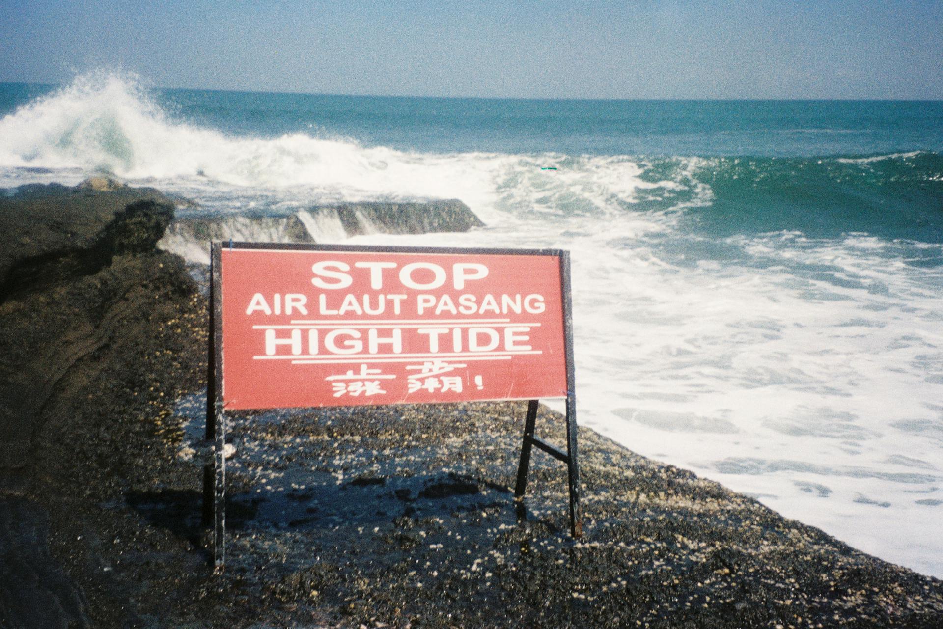 Pier during a High Tie and the Warning Sign