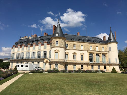 The Castle of Rambouillet in France Under Blue Sky