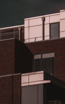 Contemporary building facade in Dublin with brick and white panels showcasing modern urban architecture.