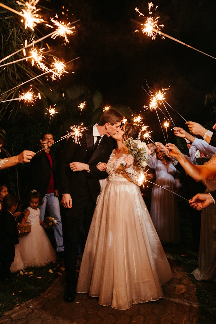 Portrait Of Newlyweds With Sparklers