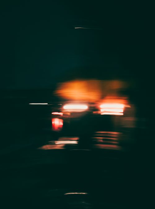 Free Dynamic motion blur of car lights creates an abstract and mysterious night scene. Stock Photo