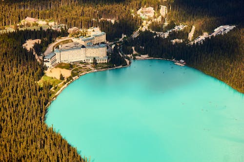 Aerial View of Buildings Beside the Lake