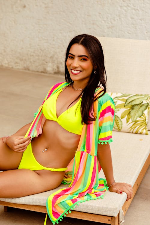 Free Happy Woman in Yellow Swimsuit Stock Photo