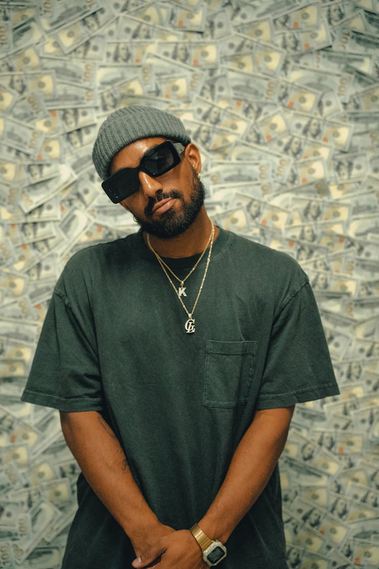 Portrait Of Rapper On Dollar Wall Background