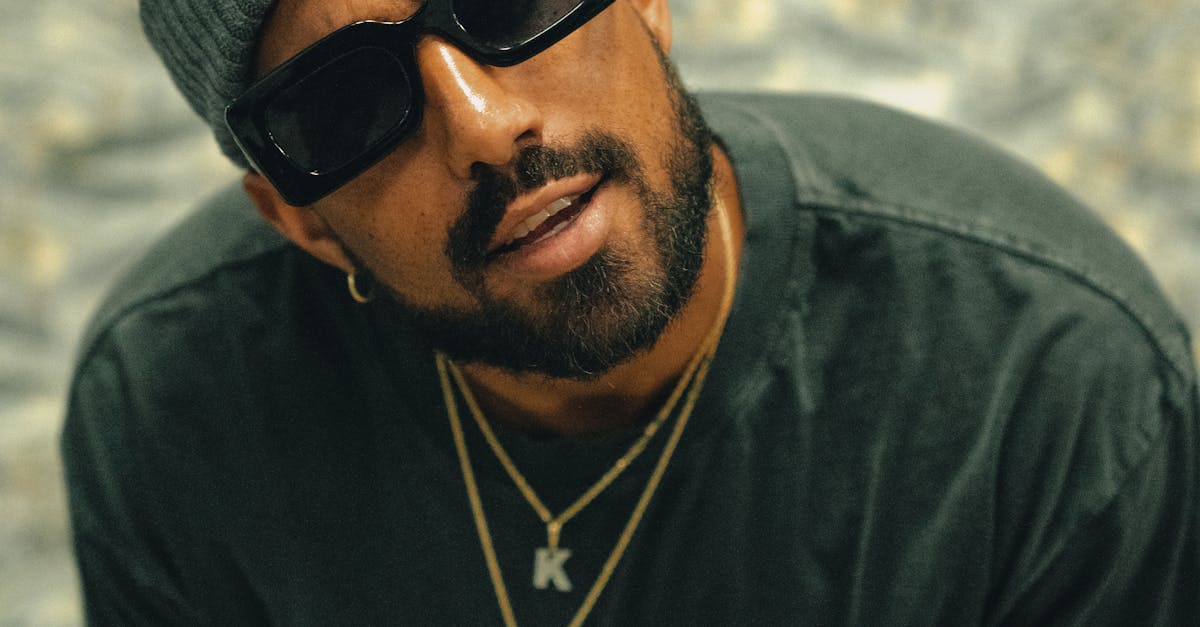 Portrait of Rapper in Sunglasses and Beanie · Free Stock Photo