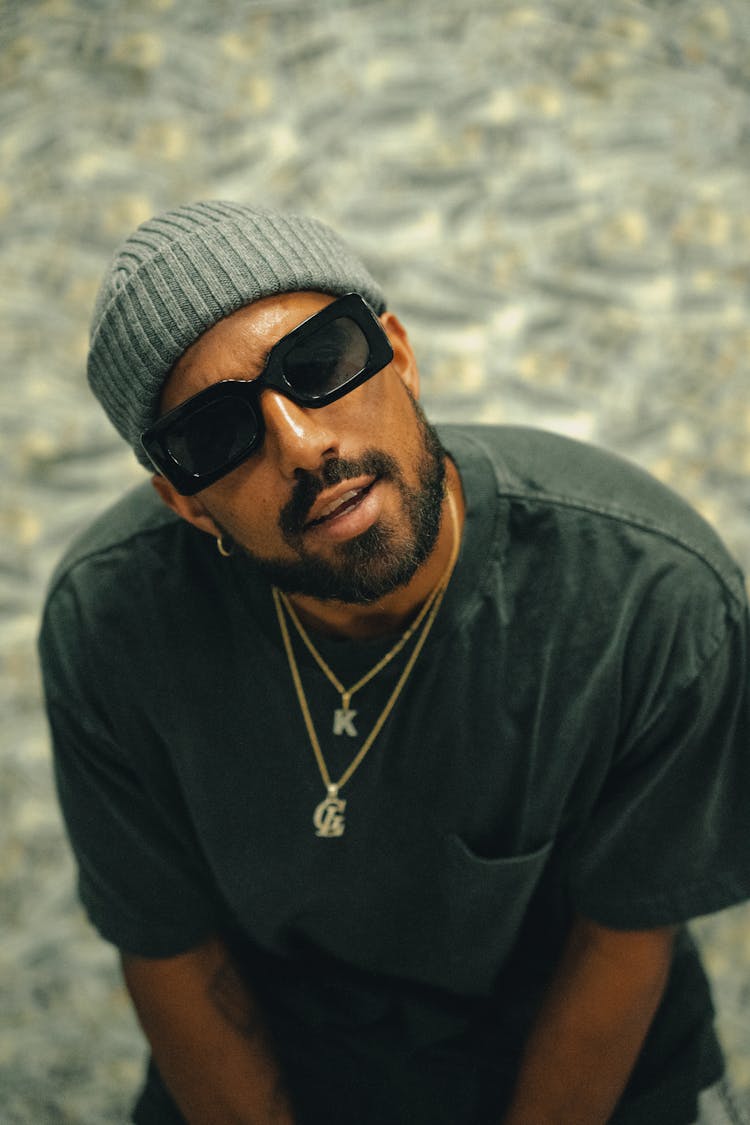 Portrait Of Rapper In Sunglasses And Beanie