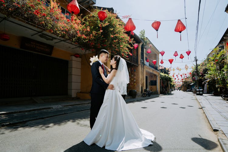 Newlywed Couple Embracing 