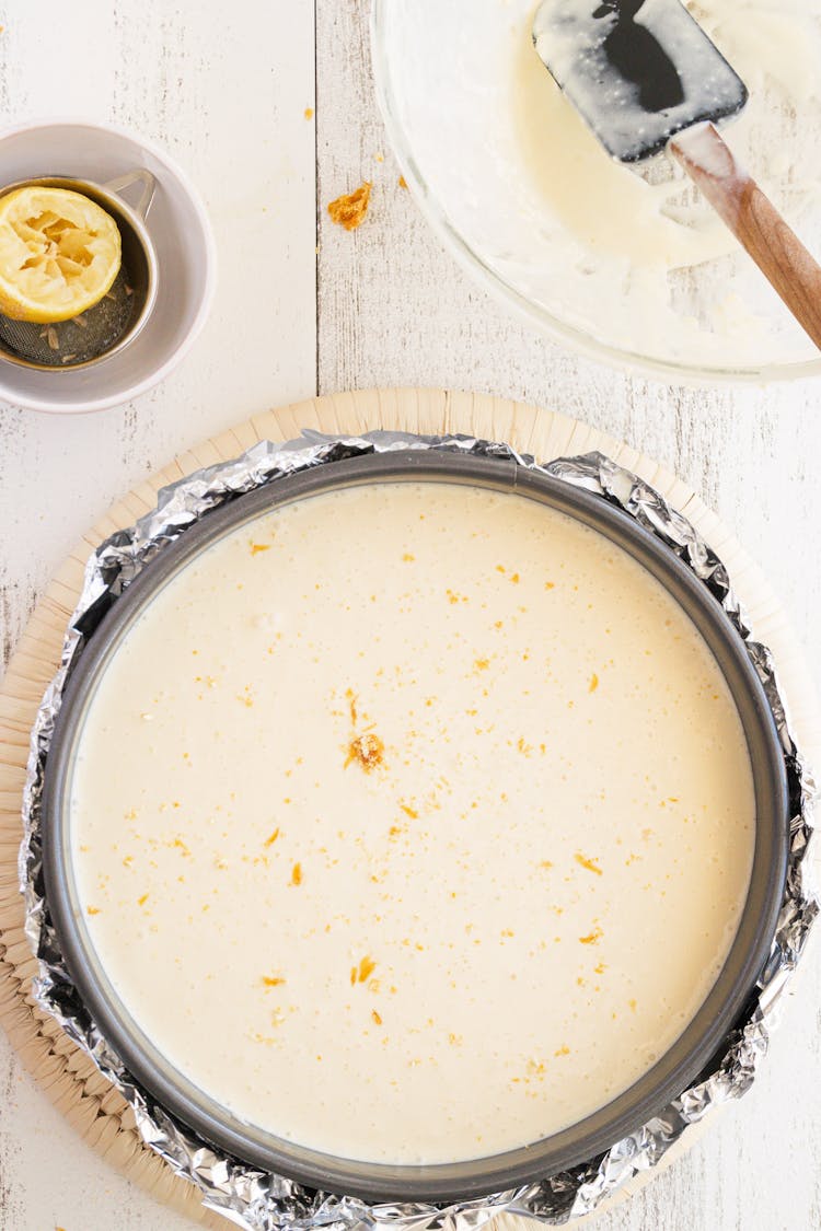 A Top View Of A Round Baking Pan With Batter