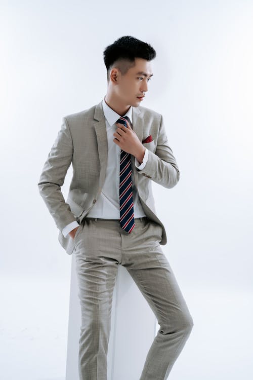 Photo of a Man in a Suit Posing 