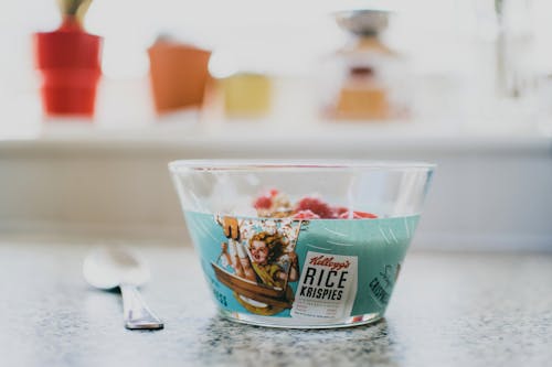 Free Rice Krispies Desert Cup Near Spoon on Gray Counter Top Stock Photo