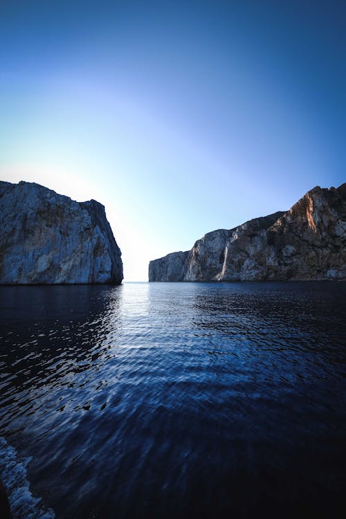 Brown Rock Formation on Sea Water