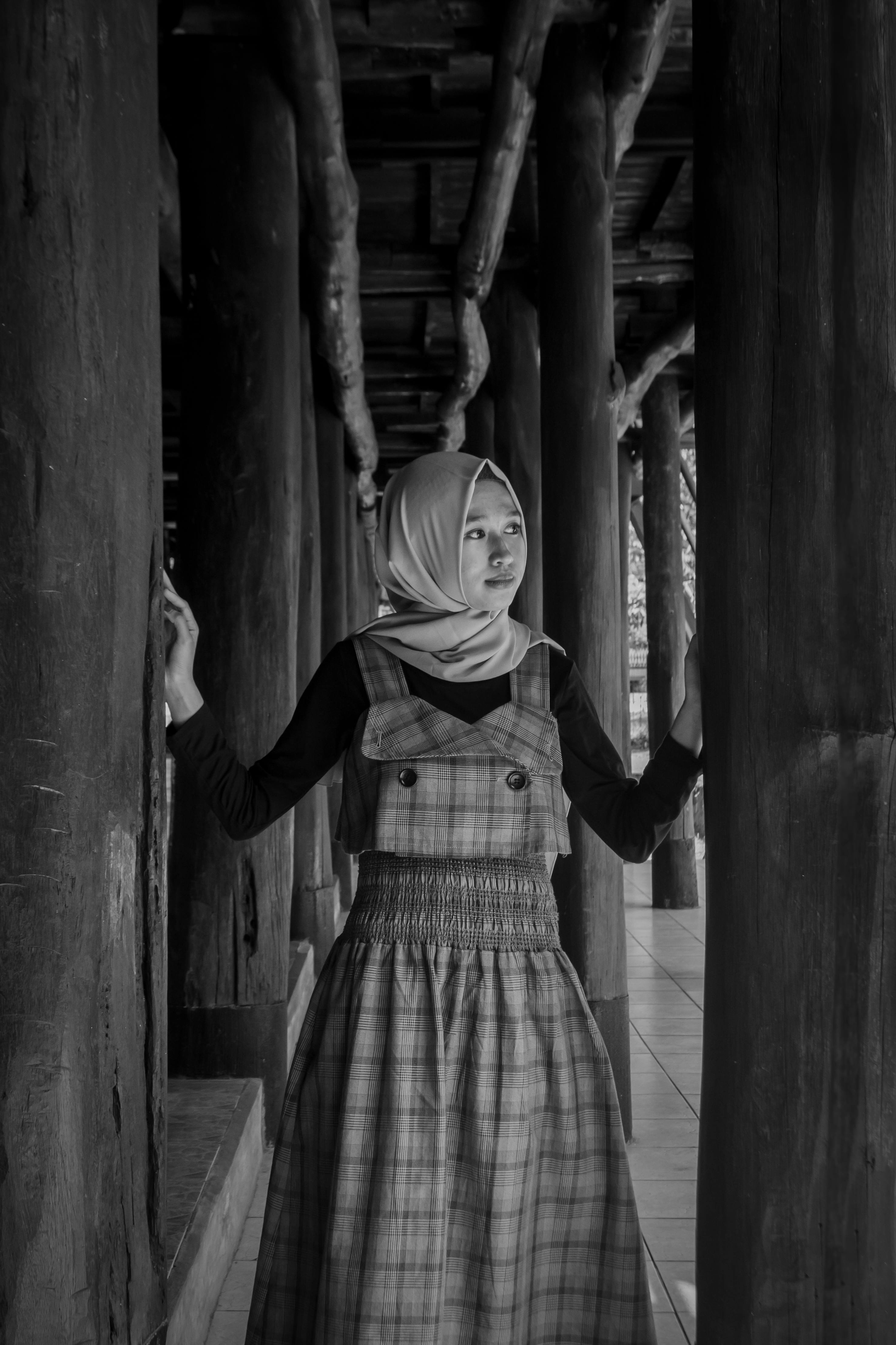 grayscale photo of a girl with a headscarf