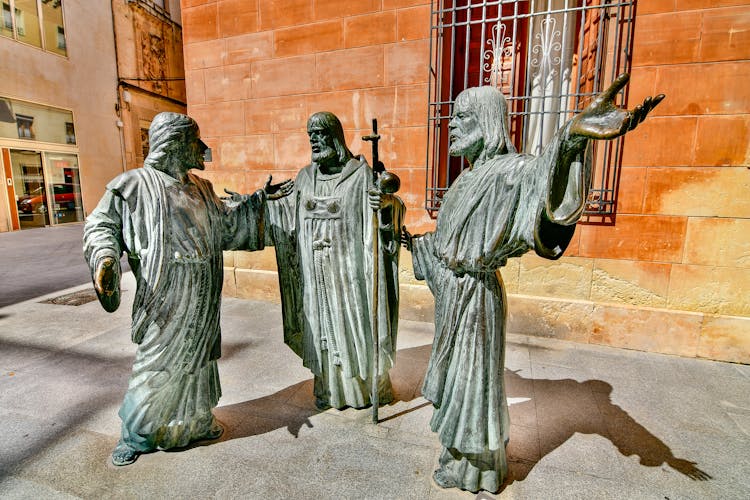 The Three Apostles Statues In Front Of Basilica Santa Maria On Alicante Spain