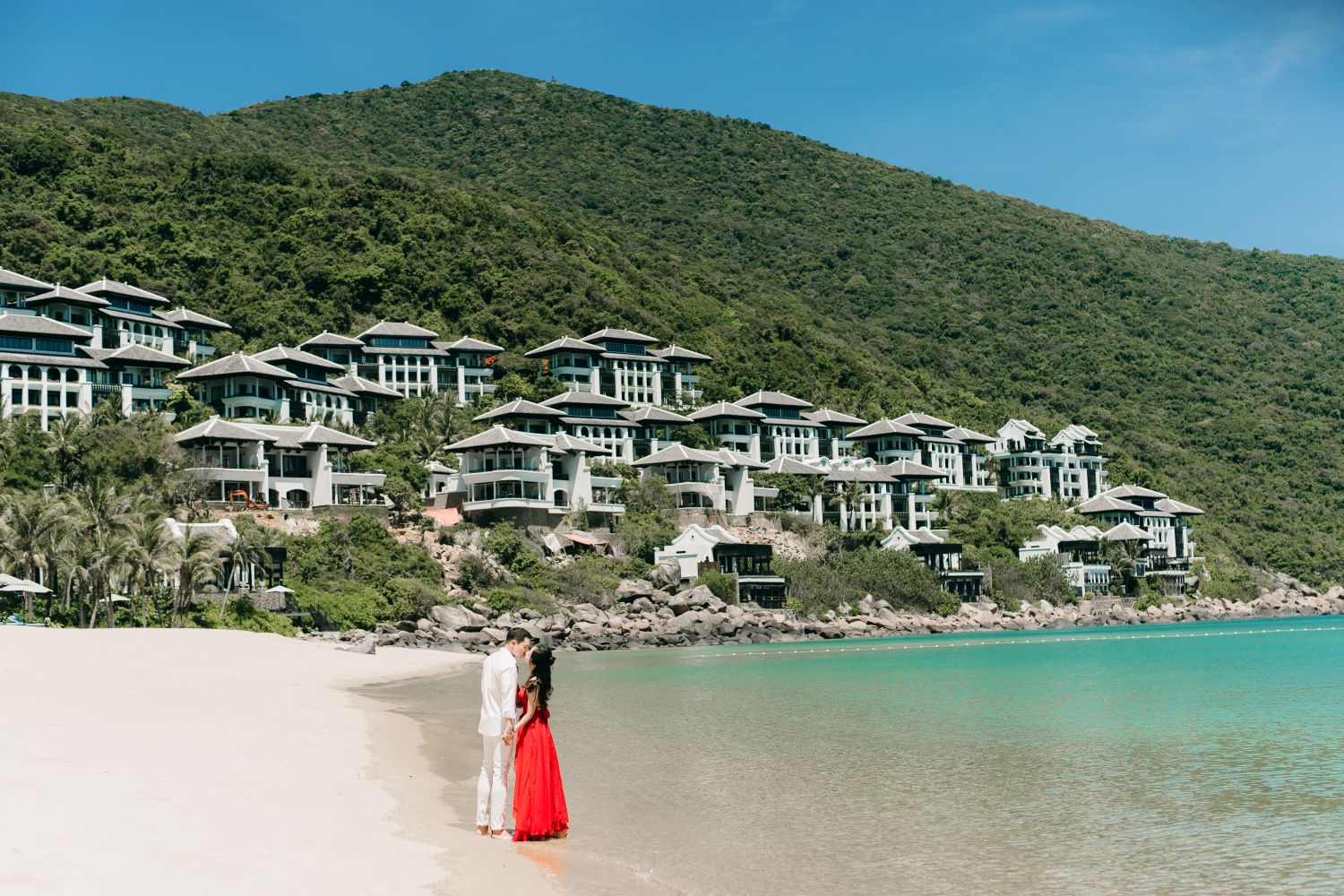 Romantic honeymoon couple on a tropical beach