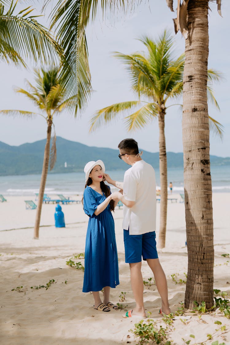 Young Couple On The Beach 