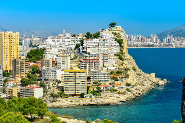 Coastal architecture in Finestrat, Spain, evoking the UK-Spain Double Taxation Convention context for cross-border landlords with property in either jurisdiction