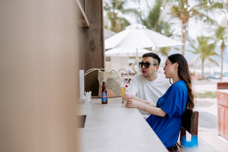 Couple Sitting A Bar