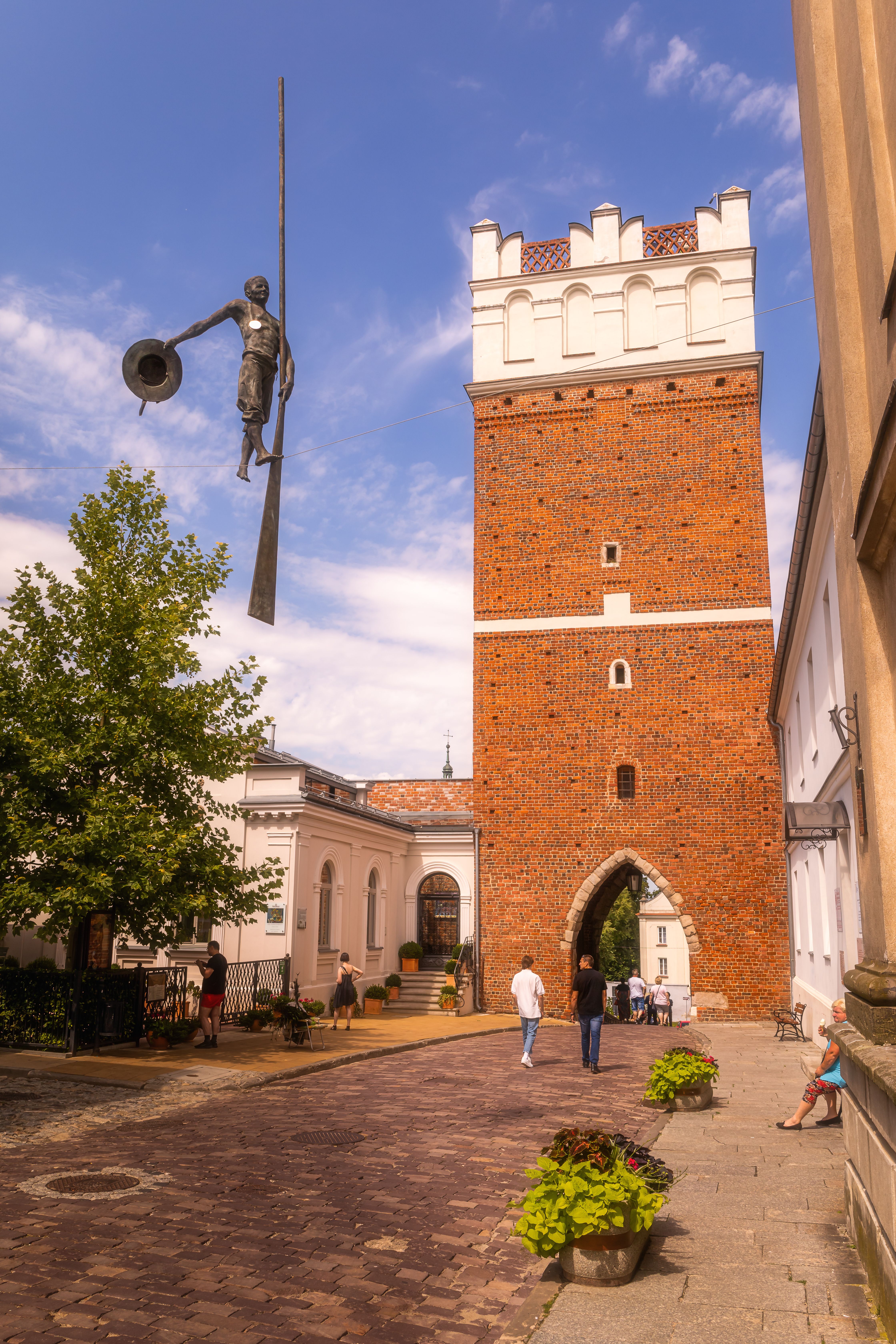 Explore the historic Opatowska Brama, a Gothic architectural landmark in Sandomierz, Poland.