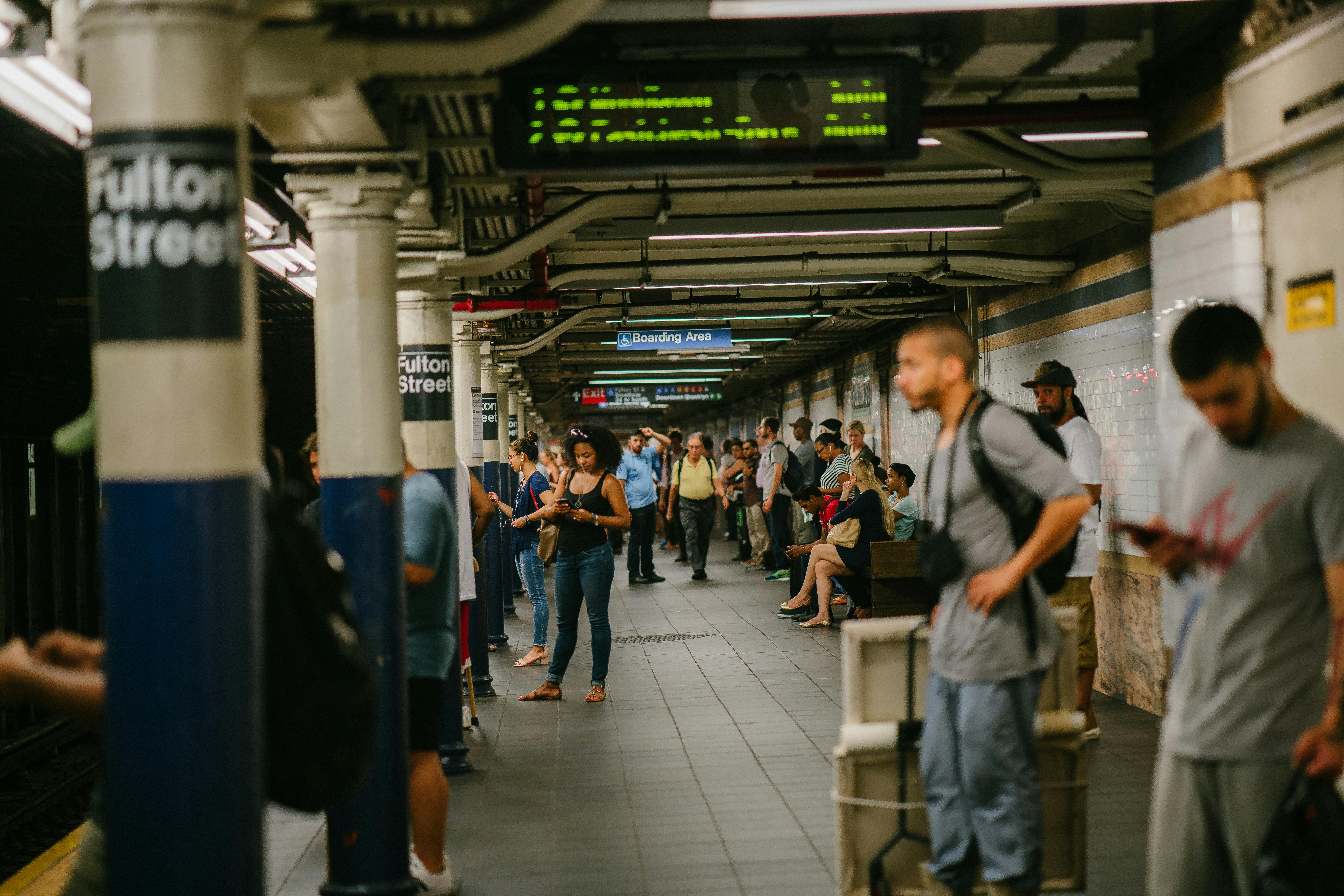 Photography of People at Train Station