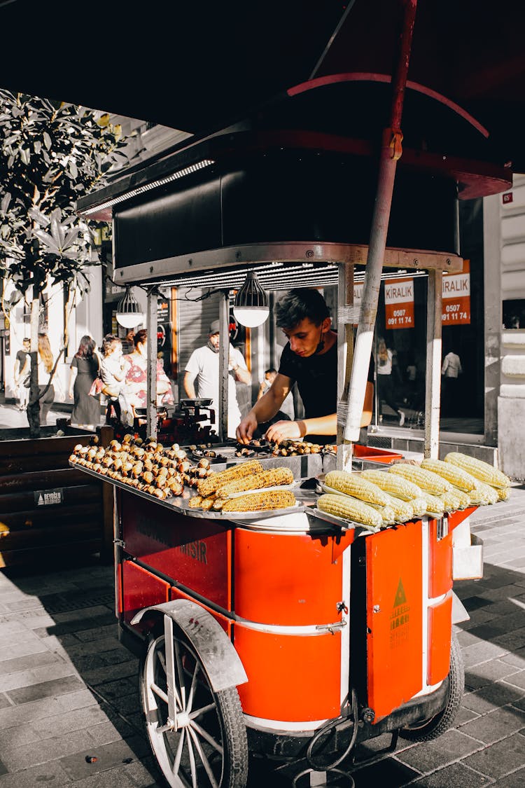 Man Selling Corn On The Street