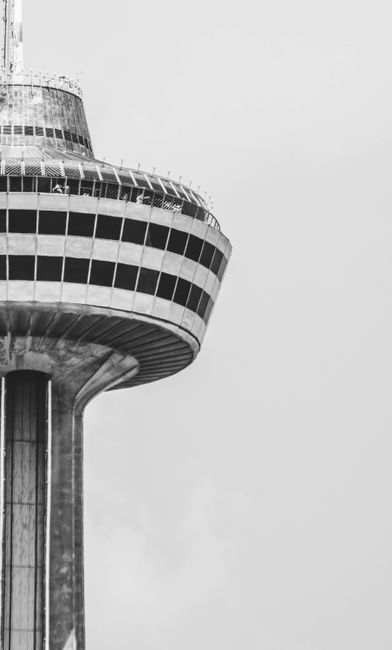 Black and white shot of Skylon Tower's architectural design in Niagara Falls, Canada.