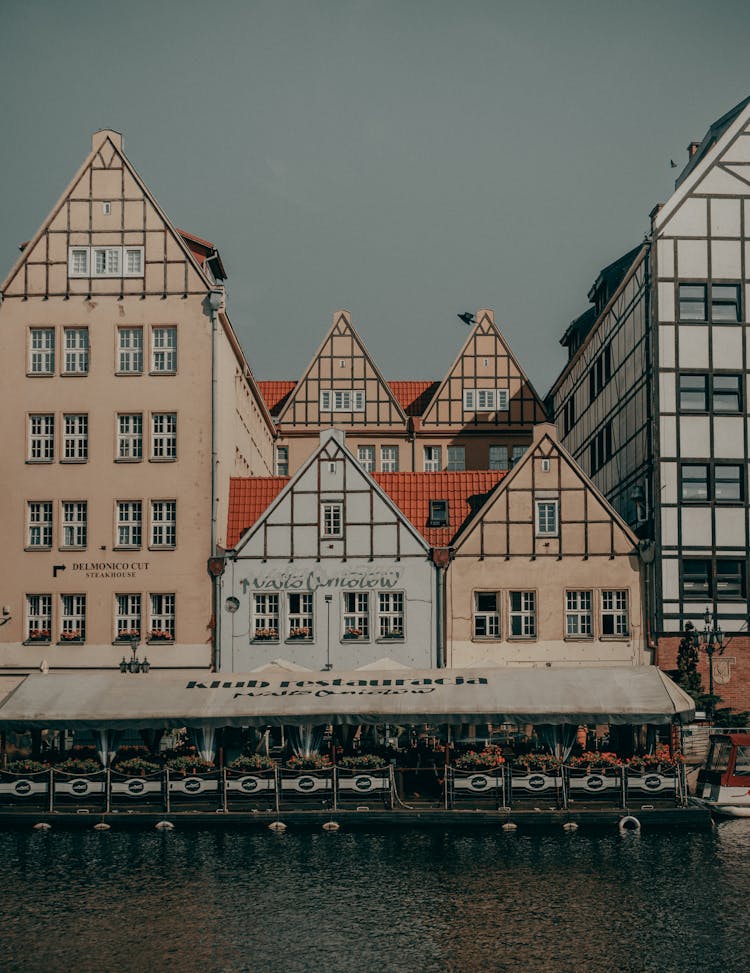 Restaurant Near Buildings By River