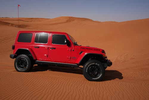 A Red Car on Desert