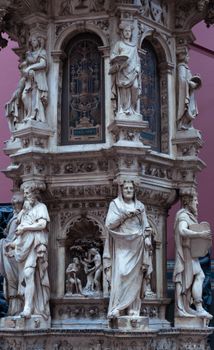 Detailed view of a baroque sculpture monument with intricate carvings and statues.