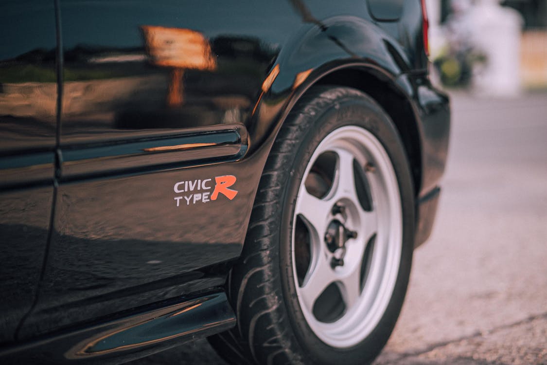 Rear Wheel of a Black Car · Free Stock Photo