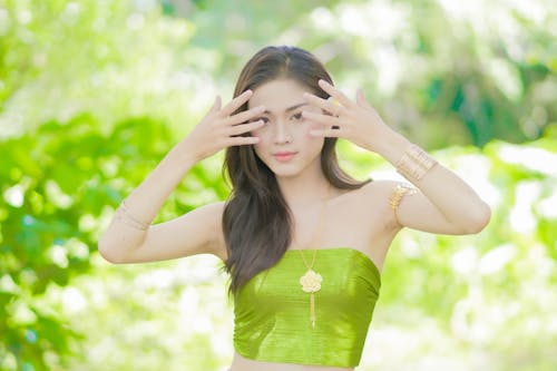 A Woman in Green Tube Top