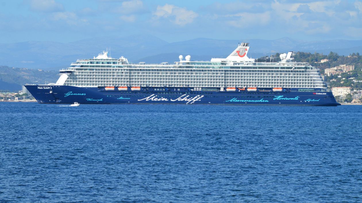 White and Blue Cruise Ship on Sea Under the Blue Sky · Free Stock Photo