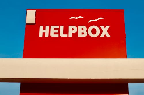 Helpbox Logo against Blue Sky