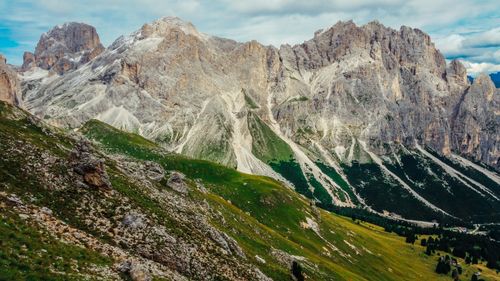 Free Breathtaking mountain landscape in the Dolomites, showcasing prominent rocky peaks and green valleys. Stock Photo
