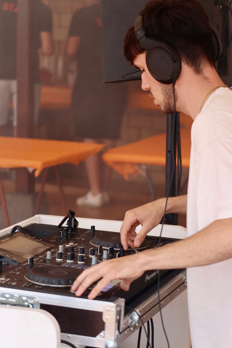 Disc Jockey Playing A Music