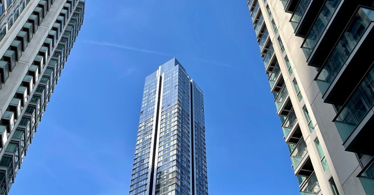 High Rise And Low Rise Building Low Angle Shot of High Rise Buildings in a City · Free Stock Photo
