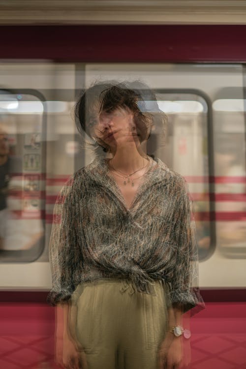 Blur Image of a Woman Inside a Train