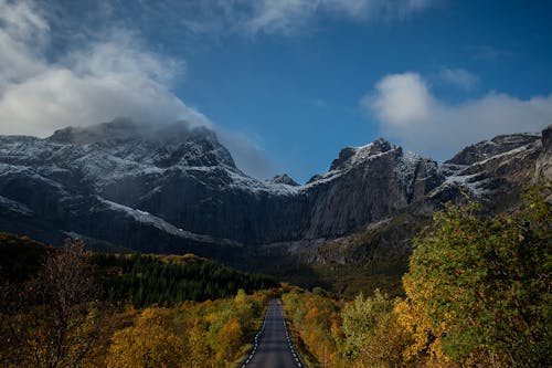 Road at the Foothills of the Stjerntinden Mountain on the Norwegian island of Flakstadoya