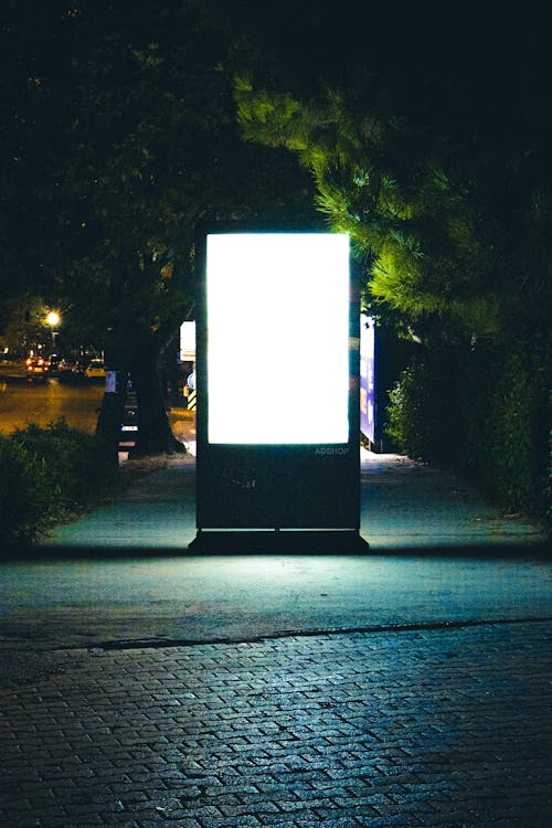 Lighted Billboard on the Sidewalk