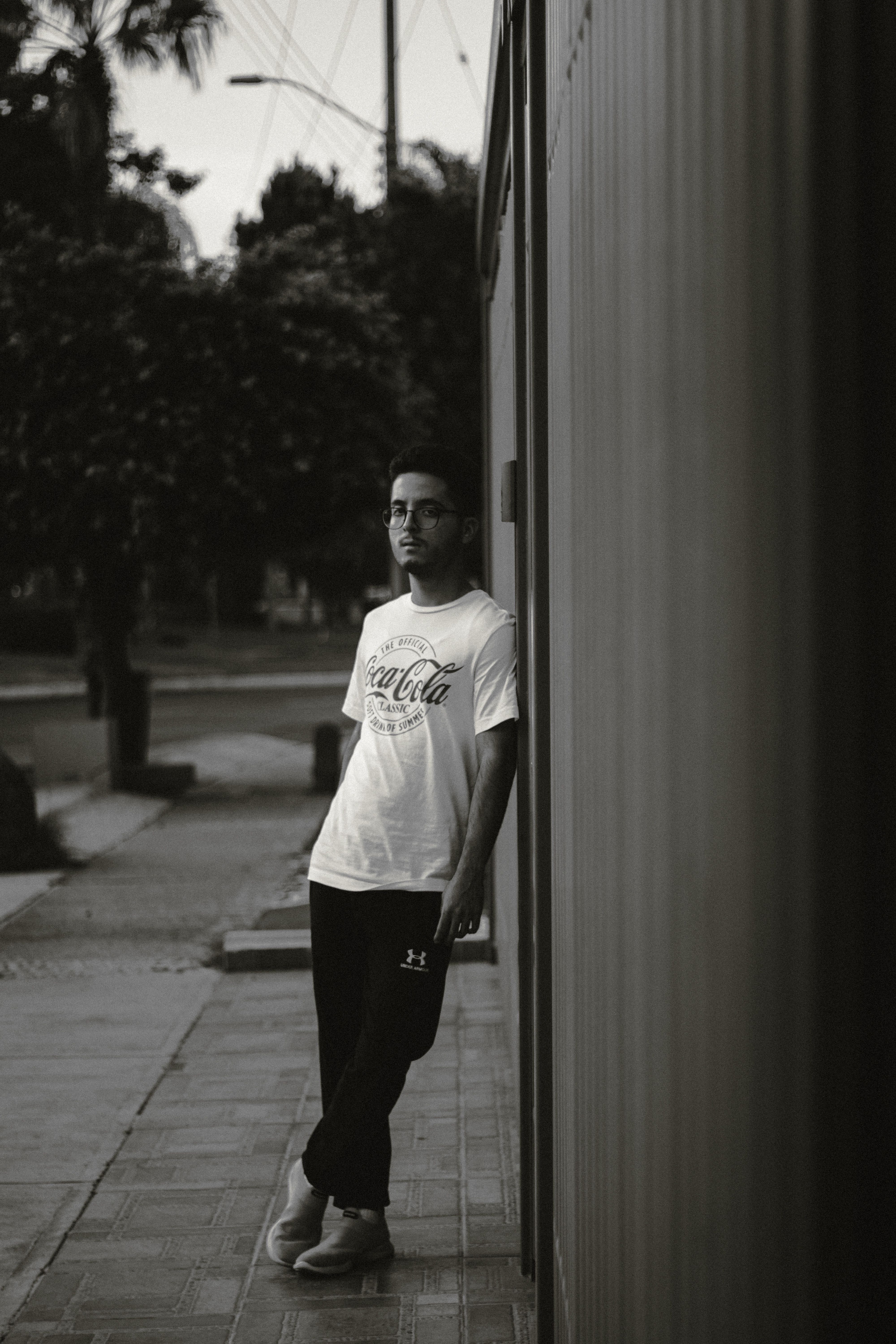 Portrait of a Man Standing on a Sidewalk · Free Stock Photo