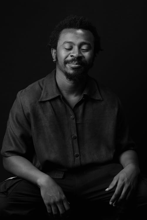 Grayscale Photo of a Bearded Man