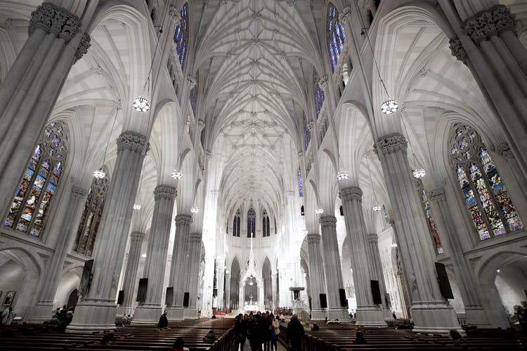 Interior Of Neo Gothic Cathedral With Colonnade And Arched Windows