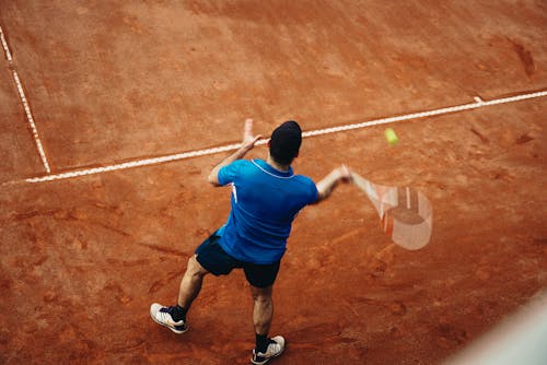 A Man Playing Tennis 