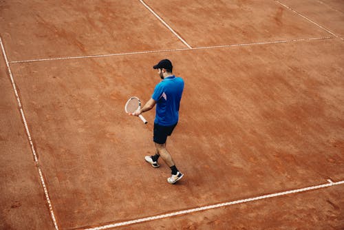 A Man in a Tennis Court 